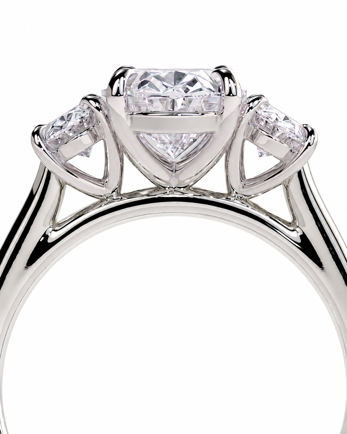 color_925_SIL,color_935_ARG,color_10K_WG, color_14K_WG &&A close-up studio shot of a silver-tone diamond ring featuring a heart-shaped center stone with two smaller diamonds flanking it on the shoulders, set against a plain white background.