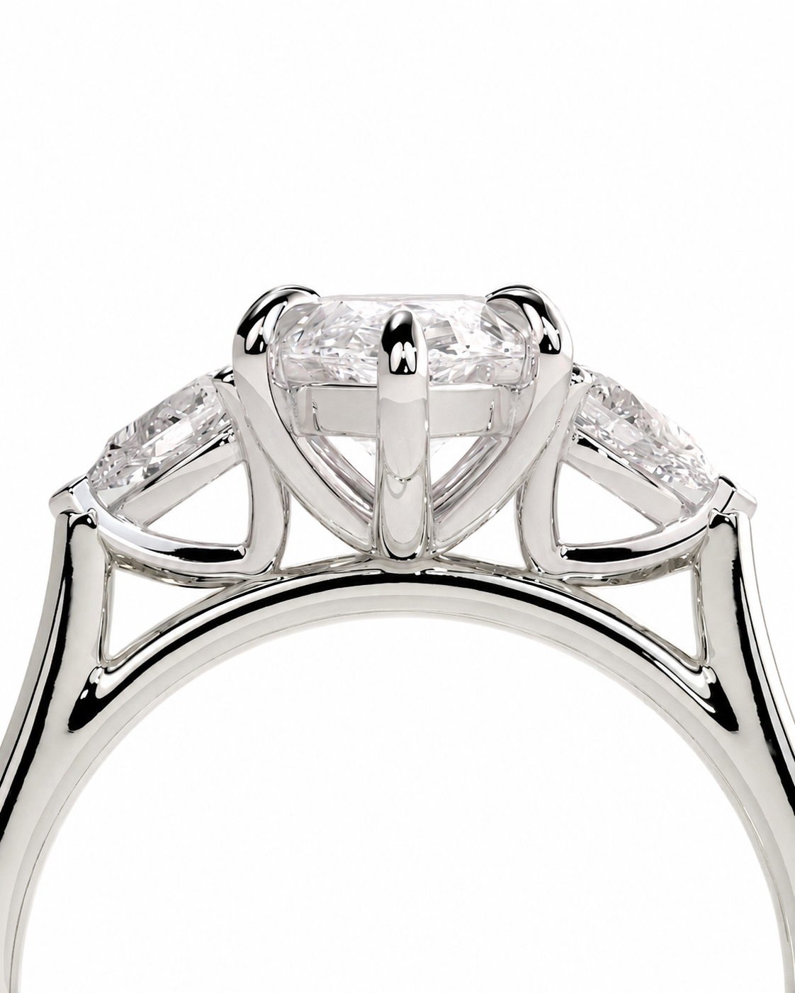 color_925_SIL,color_935_ARG,color_10K_WG, color_14K_WG &&A close-up studio shot of a silver-toned diamond ring featuring a large round center stone and smaller side stones, set against a plain white background.