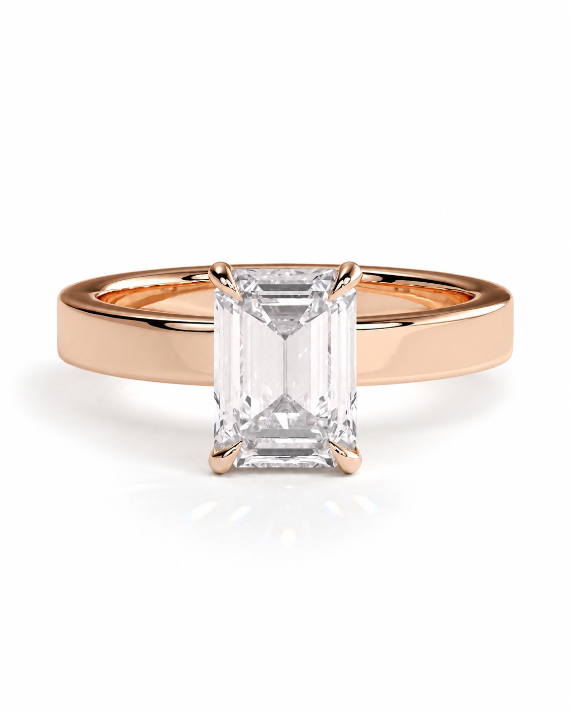 color_10K_RG, color_14K_RG &&A rose gold engagement ring featuring a large rectangular emerald-cut clear center stone, set against a clean white background.