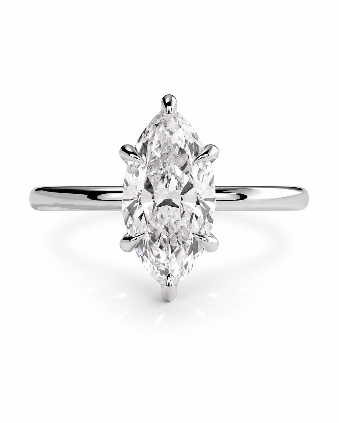 color_925_SIL,color_935_ARG,color_10K_WG, color_14K_WG &&A classic diamond engagement ring featuring a marquise-cut center stone in a six-prong setting on a polished silver-colored band, shown against a clean white background.