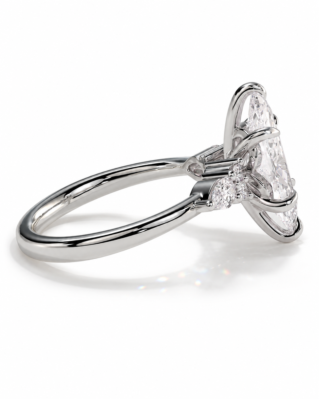 color_925_SIL,color_935_ARG,color_10K_WG, color_14K_WG &&A silver-toned diamond ring featuring a large marquise-cut center stone and smaller round diamonds on the shoulders, shown on a clean white background.