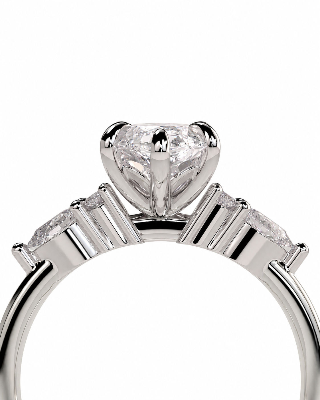 color_925_SIL,color_935_ARG,color_10K_WG, color_14K_WG &&A close-up shot of a silver-toned ring featuring a heart-shaped clear gemstone in a prong setting, with marquise-cut side stones on a white background.