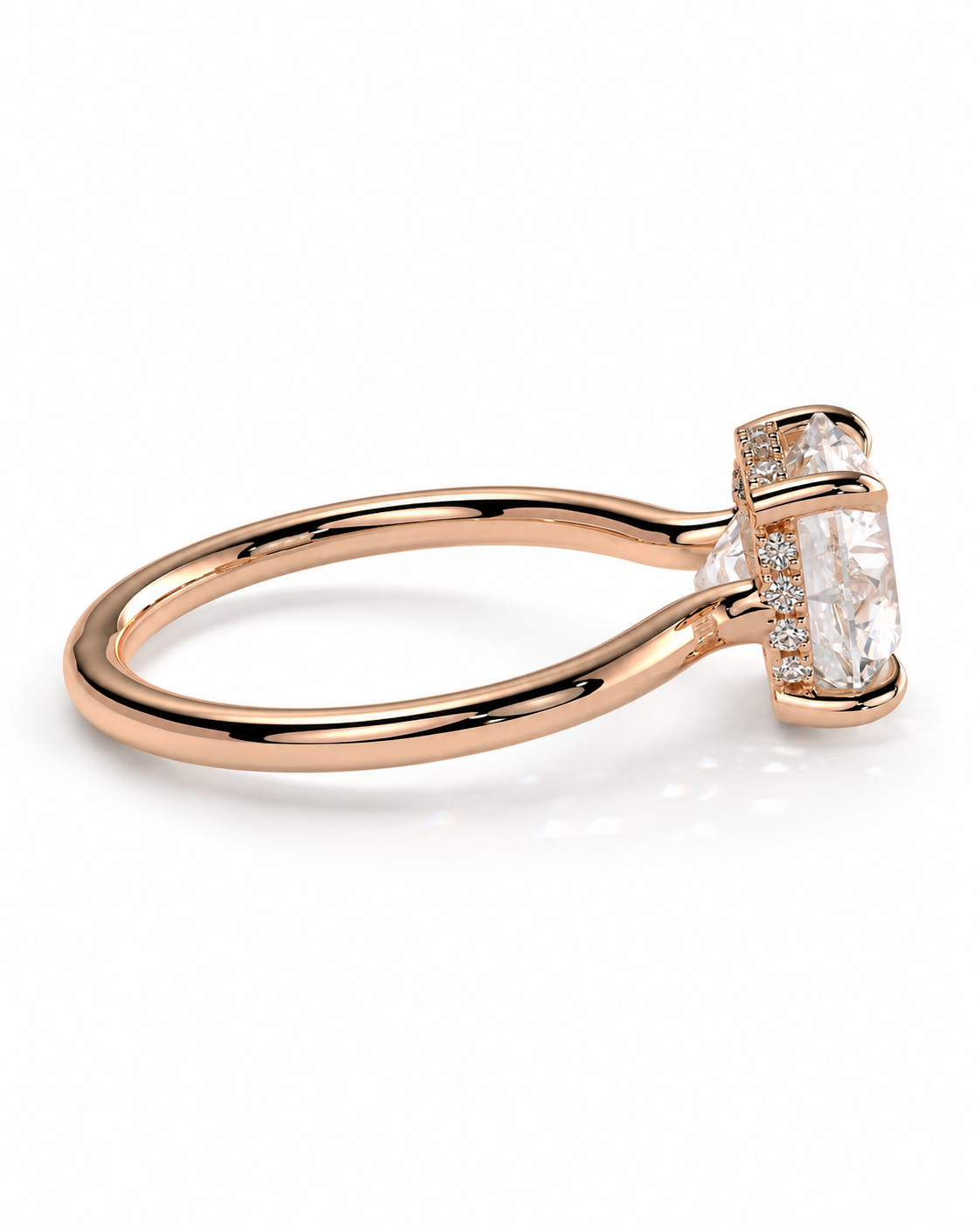 color_10K_RG, color_14K_RG &&A rose gold engagement ring featuring a large oval-cut clear center stone in a halo setting with small accent diamonds, shown on a clean white background.