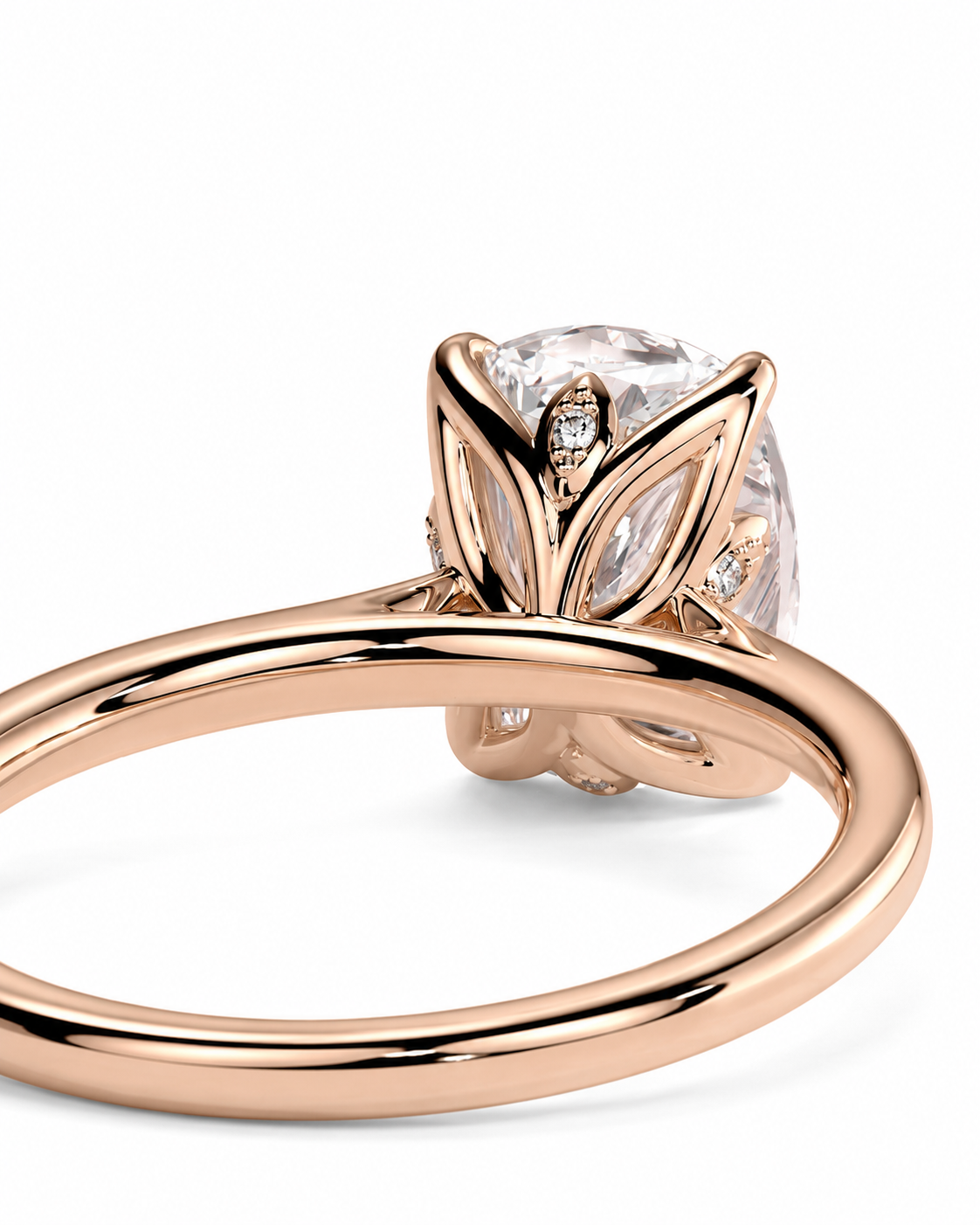 color_10K_RG, color_14K_RG &&Rose gold solitaire ring with a large clear round-cut gemstone in a prong setting, shown on a clean white background.