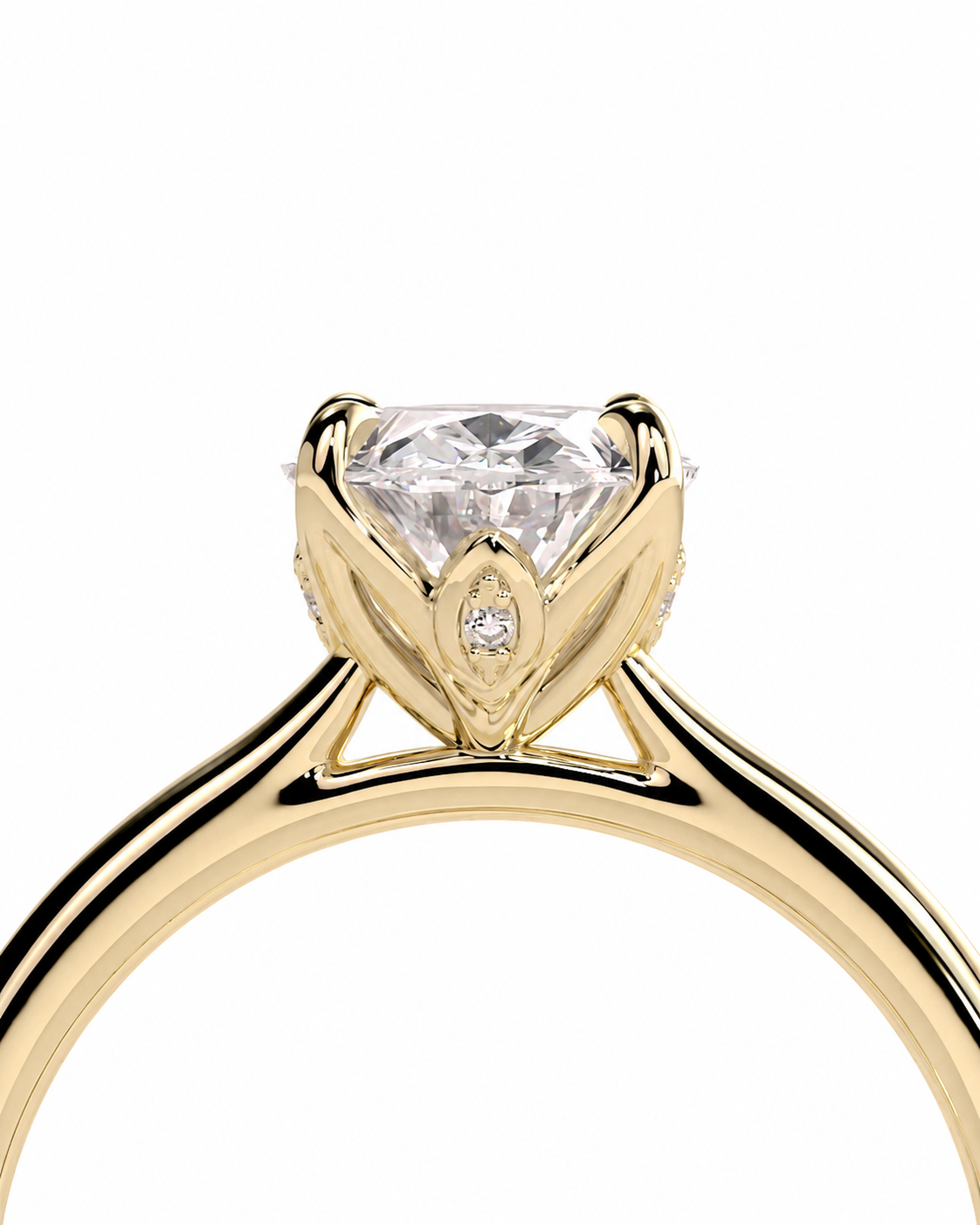 color_10K_YG, color_14K_YG &&A close-up studio shot of a yellow gold ring with a large clear round-cut center stone and a smaller marquise-cut accent stone, set against a plain white background.