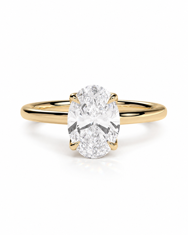 color_10K_YG, color_14K_YG &&An oval-cut diamond engagement ring with a yellow gold band, shown on a clean white background.