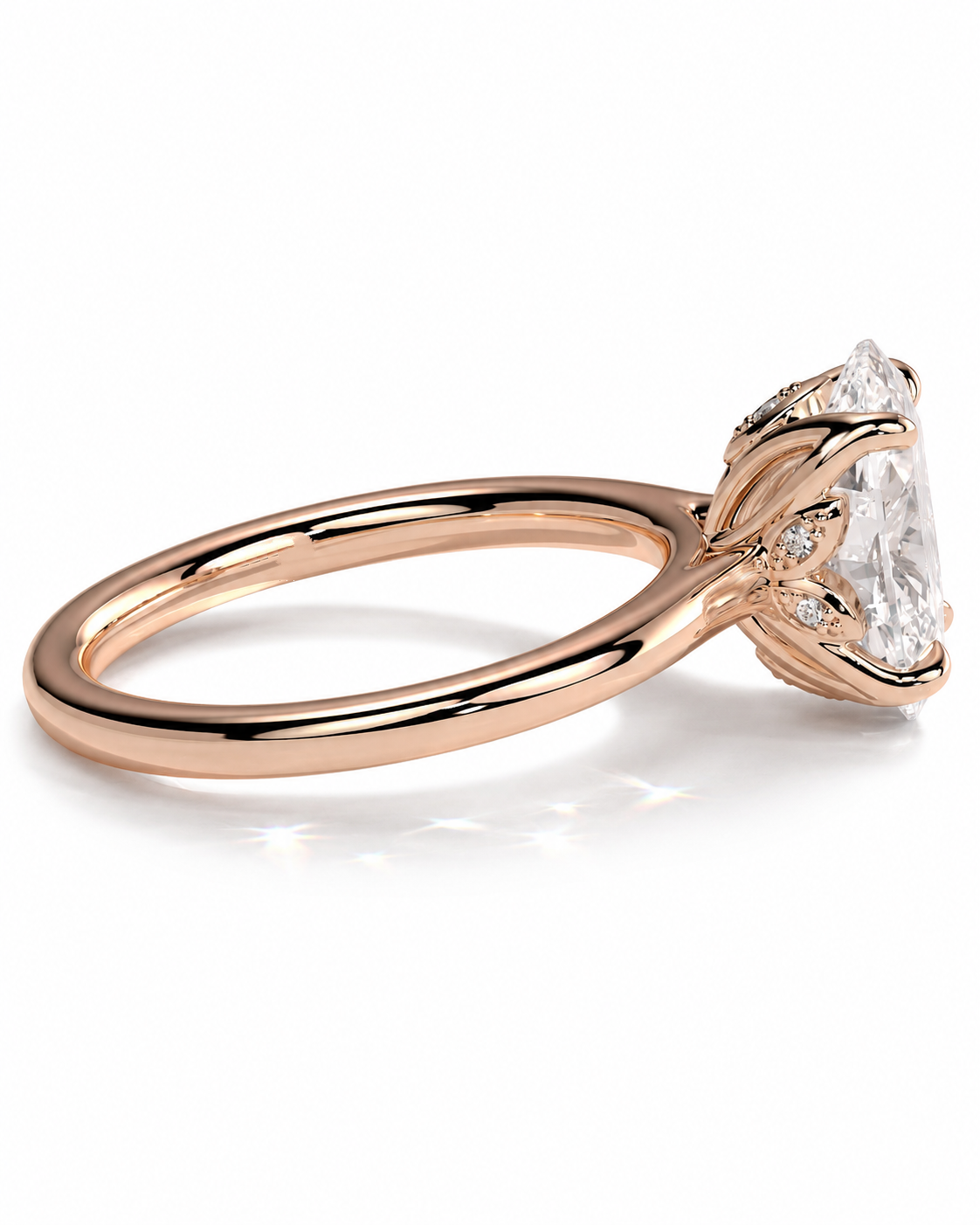 color_10K_RG, color_14K_RG &&A rose gold engagement ring featuring a large oval-cut clear gemstone in a prong setting, with small accent diamonds along the band, shown on a clean white background.