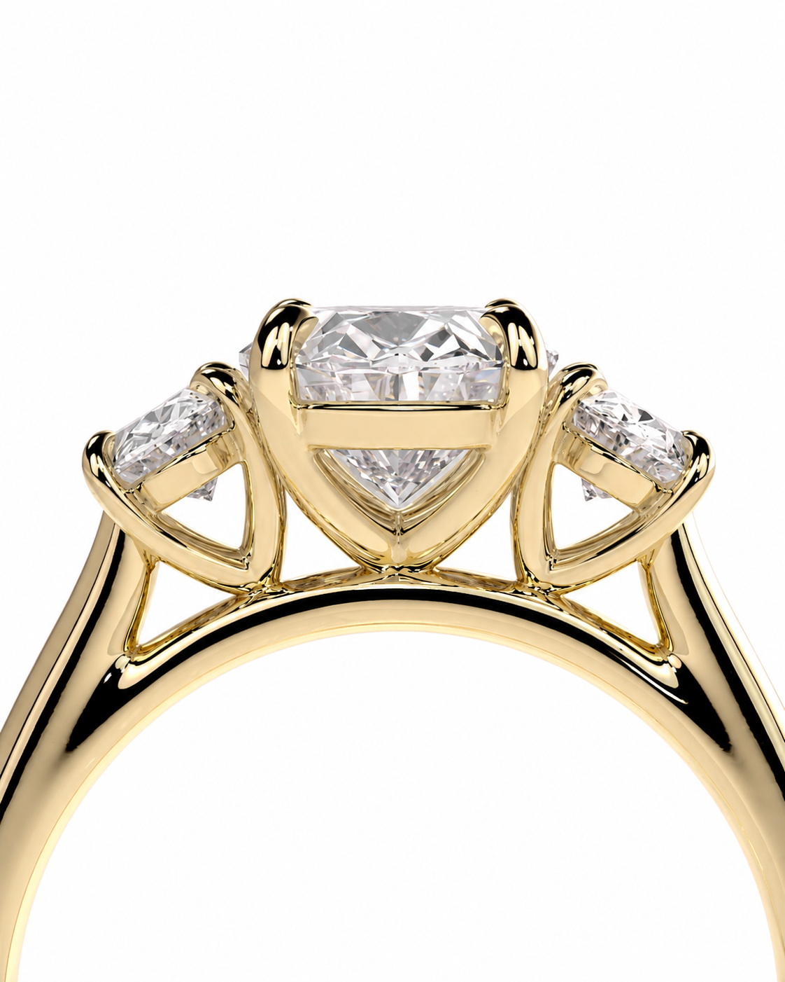 color_10K_YG, color_14K_YG &&A close-up of a yellow gold ring featuring a central heart-shaped diamond with two smaller marquise-cut diamonds on either side, set against a plain white background.