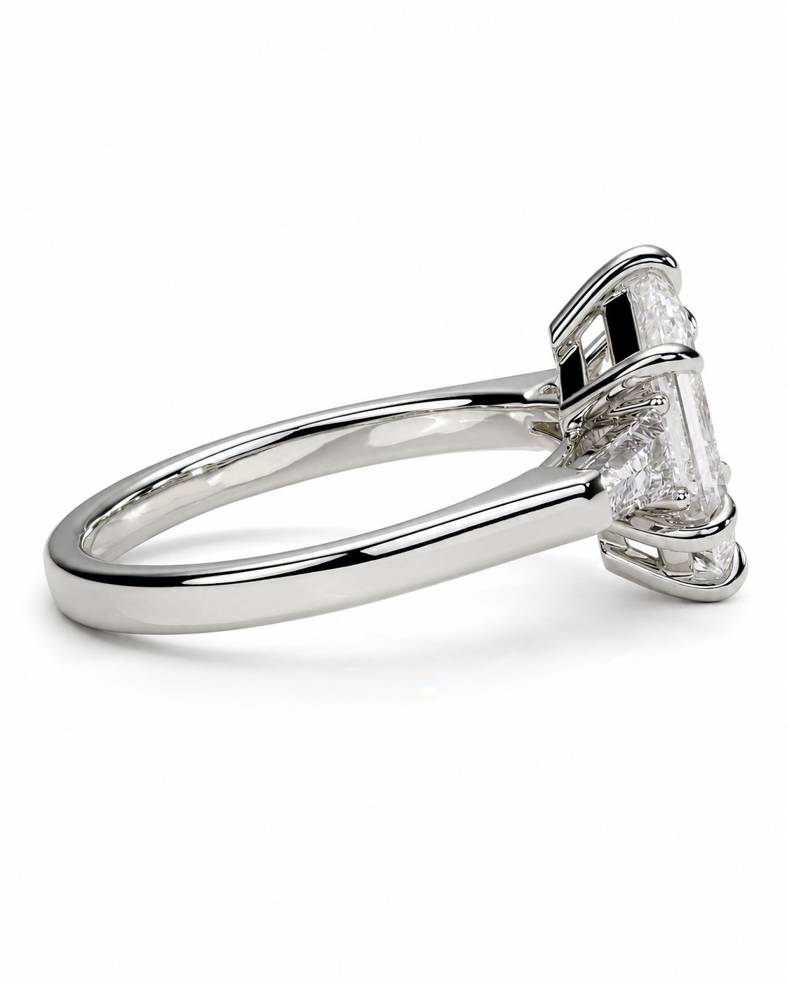 color_925_SIL,color_935_ARG,color_10K_WG, color_14K_WG &&A silver-toned diamond ring featuring a large emerald-cut center stone in a four-prong setting, shown from a side angle on a clean white background.