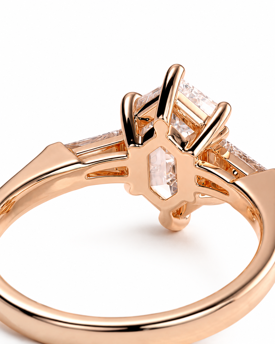 color_10K_RG, color_14K_RG &&Rose gold ring with a six-stone cluster setting featuring a central marquise-cut stone and three rectangular side stones, shown on a white background.