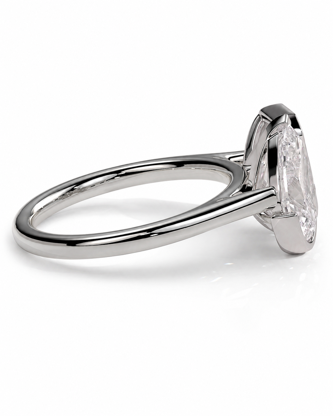 color_925_SIL,color_935_ARG,color_10K_WG, color_14K_WG &&A silver-toned solitaire ring featuring a large, clear rectangular gemstone in a prong setting, shown from a side angle on a clean white background.