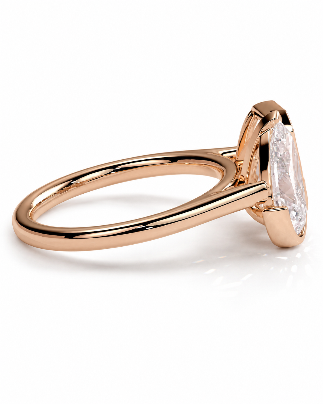 color_10K_RG, color_14K_RG &&A rose gold ring with a large rectangular clear gemstone, shown in a close-up side profile on a clean white background.