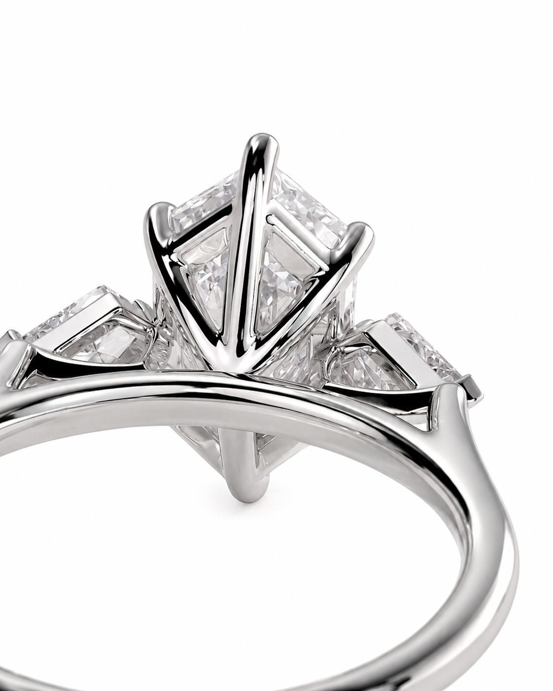 color_925_SIL,color_935_ARG,color_10K_WG, color_14K_WG &&Close-up of a silver-toned ring with a large geometric cluster of clear stones and smaller side stones on a white background.
