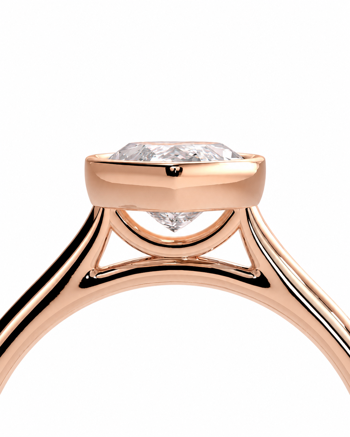 color_10K_RG, color_14K_RG &&Close-up of a rose gold ring with a brilliant round-cut diamond set in a three-stone arrangement, shown against a solid white background.