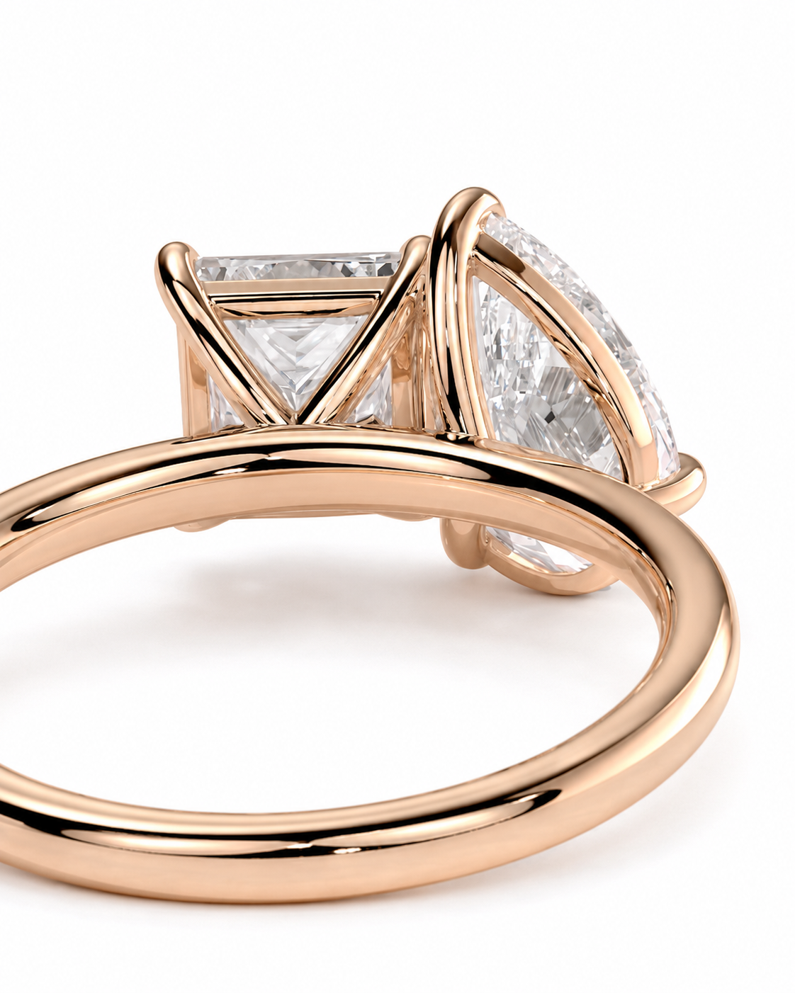 color_10K_RG, color_14K_RG &&Rose gold ring with a triangular diamond cluster setting, shown in a close-up side view on a white background.