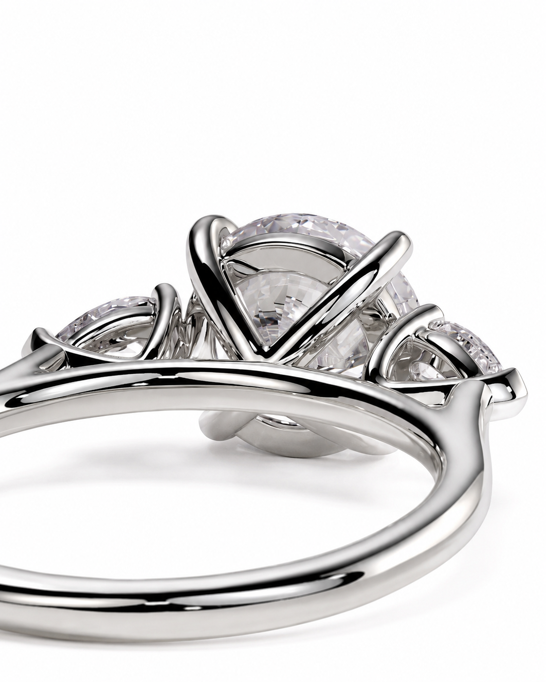 color_925_SIL,color_935_ARG,color_10K_WG, color_14K_WG &&A close-up studio shot of a silver-toned ring with a large oval clear center stone and smaller side stones, shown on a clean white background.