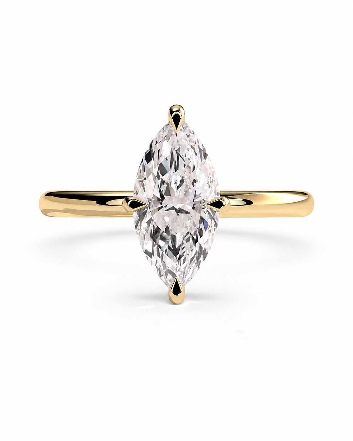 color_10K_YG, color_14K_YG &&A yellow gold solitaire ring featuring a marquise-cut diamond center stone, set against a clean white background.