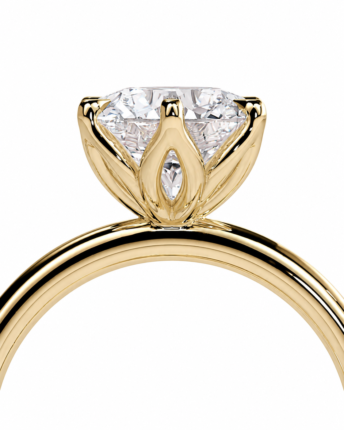 color_10K_YG, color_14K_YG &&A close-up of a yellow gold solitaire engagement ring featuring a marquise-cut center diamond and a smaller diamond in the pavé setting, shown on a plain white background.