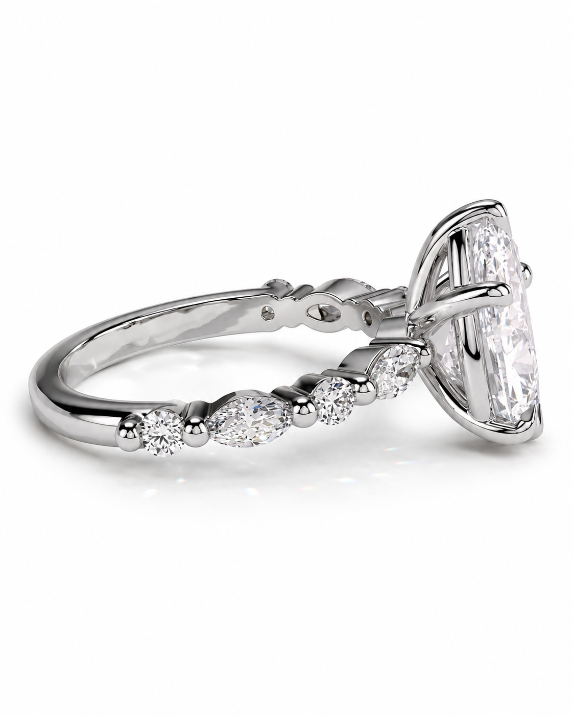 color_925_SIL,color_935_ARG,color_10K_WG, color_14K_WG &&A silver-toned diamond ring featuring a large marquise-cut center stone and a row of smaller marquise-cut stones along the band, shown on a clean white background.