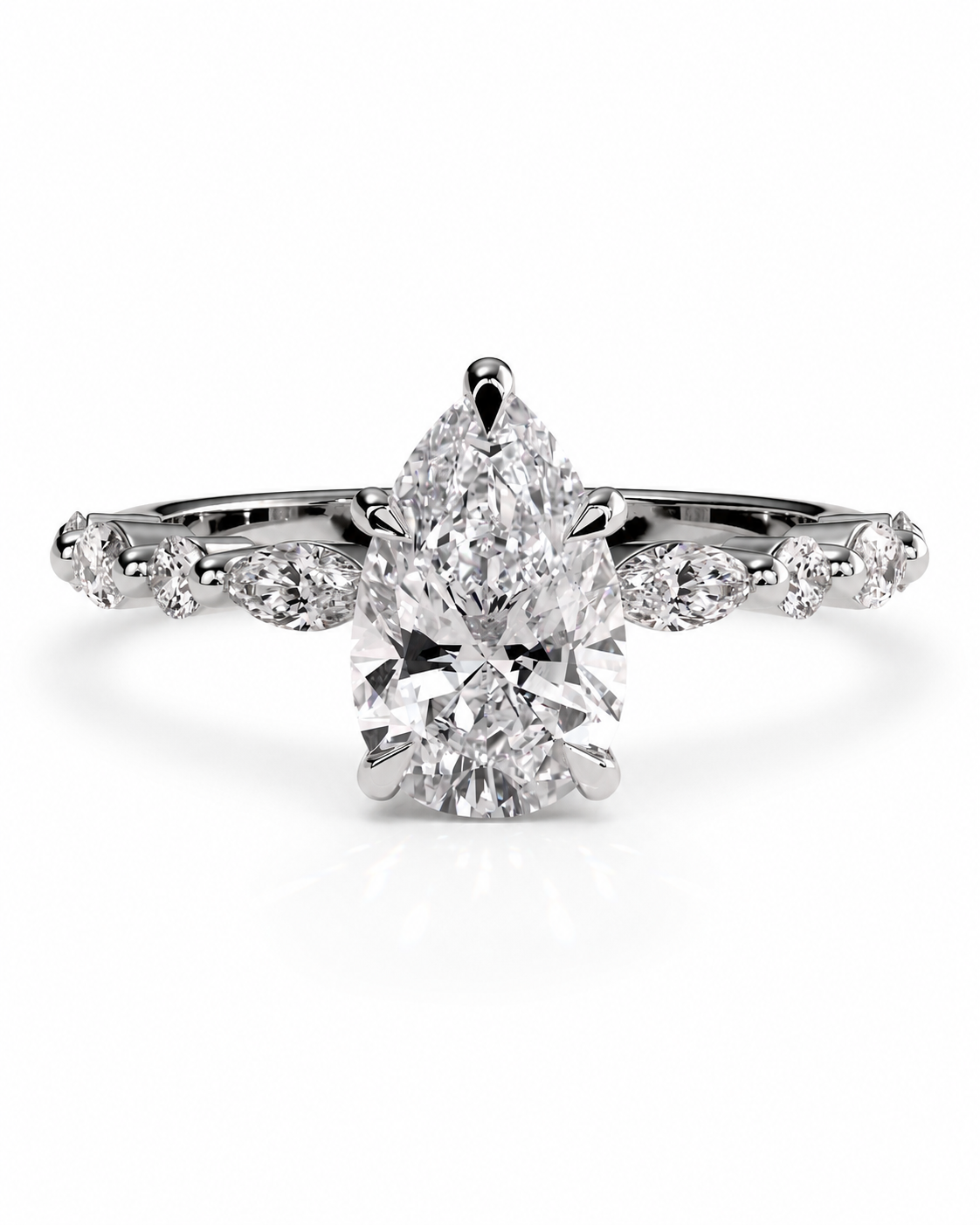 color_925_SIL,color_935_ARG,color_10K_WG, color_14K_WG &&A pear-cut diamond engagement ring with a radiant halo and a shank accented by small round diamonds, set in a silver-colored metal on a white background.