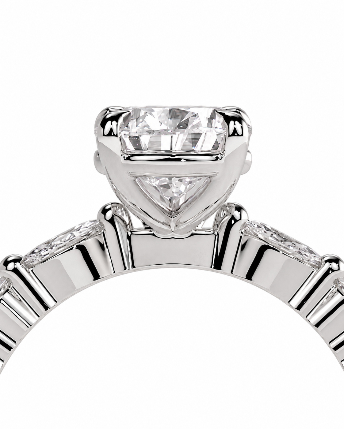 color_925_SIL,color_935_ARG,color_10K_WG, color_14K_WG &&A close-up studio shot of a silver-toned solitaire engagement ring with a large round brilliant-cut diamond and smaller diamonds along the band, set against a plain white background.