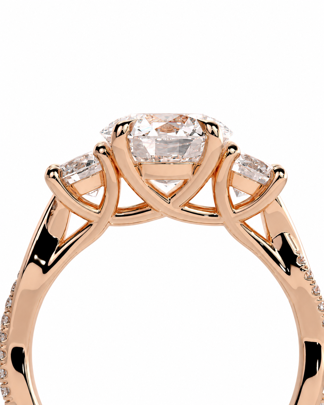 color_10K_RG, color_14K_RG &&Rose gold ring with a large oval-cut center stone and smaller side stones, shown in a close-up studio shot on a white background.