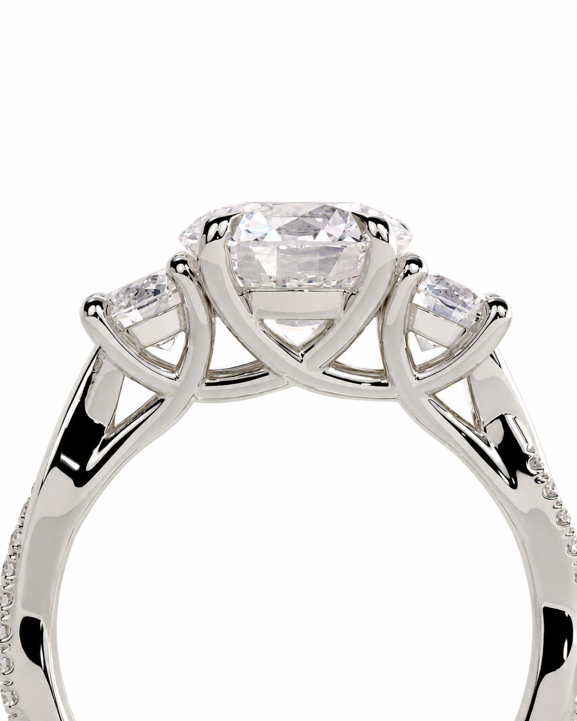 color_925_SIL,color_935_ARG,color_10K_WG, color_14K_WG &&A close-up of a silver-tone ring featuring a large oval center stone and two smaller round side stones, shown against a plain white background.