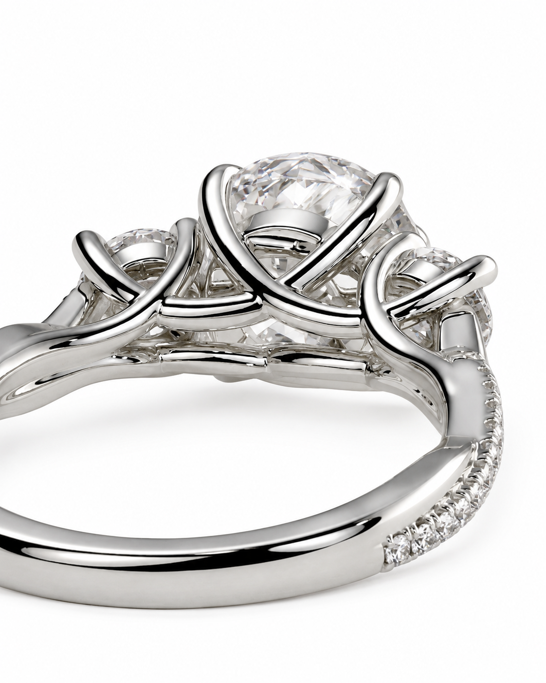 color_925_SIL,color_935_ARG,color_10K_WG, color_14K_WG &&A close-up studio shot of a silver-toned diamond ring with a large round center stone and smaller diamonds along the band, set against a plain white background.