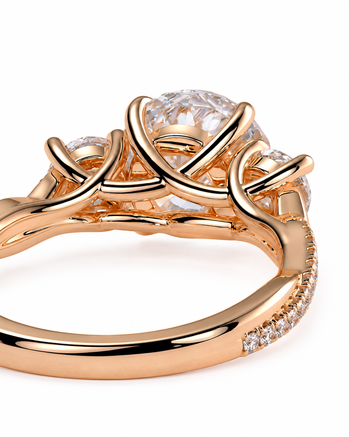 color_10K_RG, color_14K_RG &&Rose gold ring with a large round clear center stone and smaller side stones, shown in a close-up studio shot on a white background.