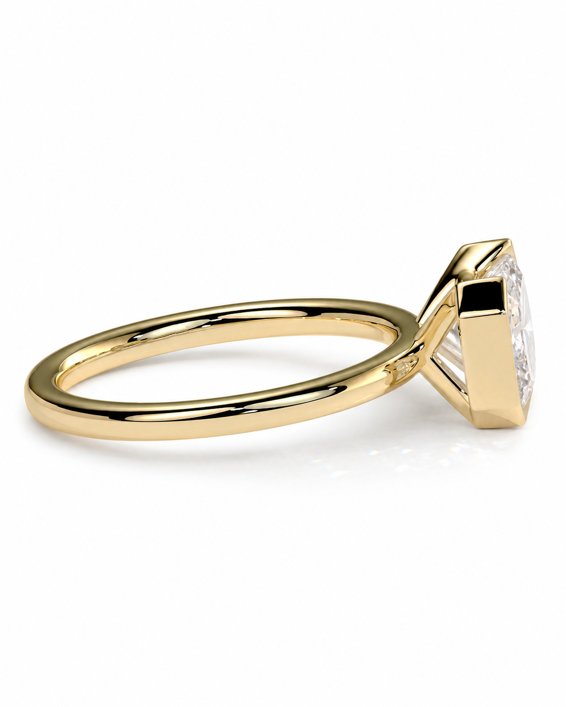 color_10K_YG, color_14K_YG &&A yellow gold solitaire engagement ring featuring a large rectangular radiant-cut diamond, shown in a three-quarter side view on a clean white background.