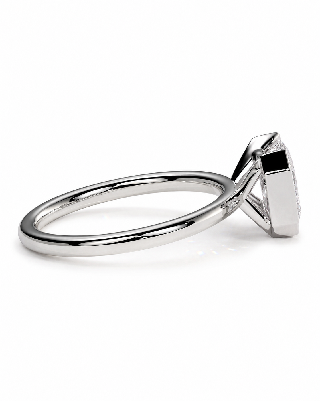 color_925_SIL,color_935_ARG,color_10K_WG, color_14K_WG &&A silver-toned solitaire ring with a triangular bezel setting and a clear gemstone, shown from a side profile view on a white background.
