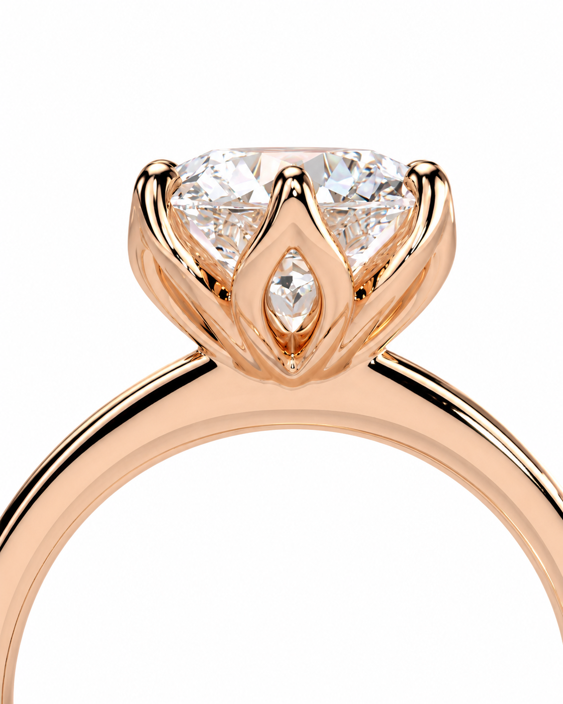 color_10K_RG, color_14K_RG &&Close-up of a rose gold ring with a large round-cut clear gemstone and a smaller marquise-cut gemstone in the center, set against a plain white background.
