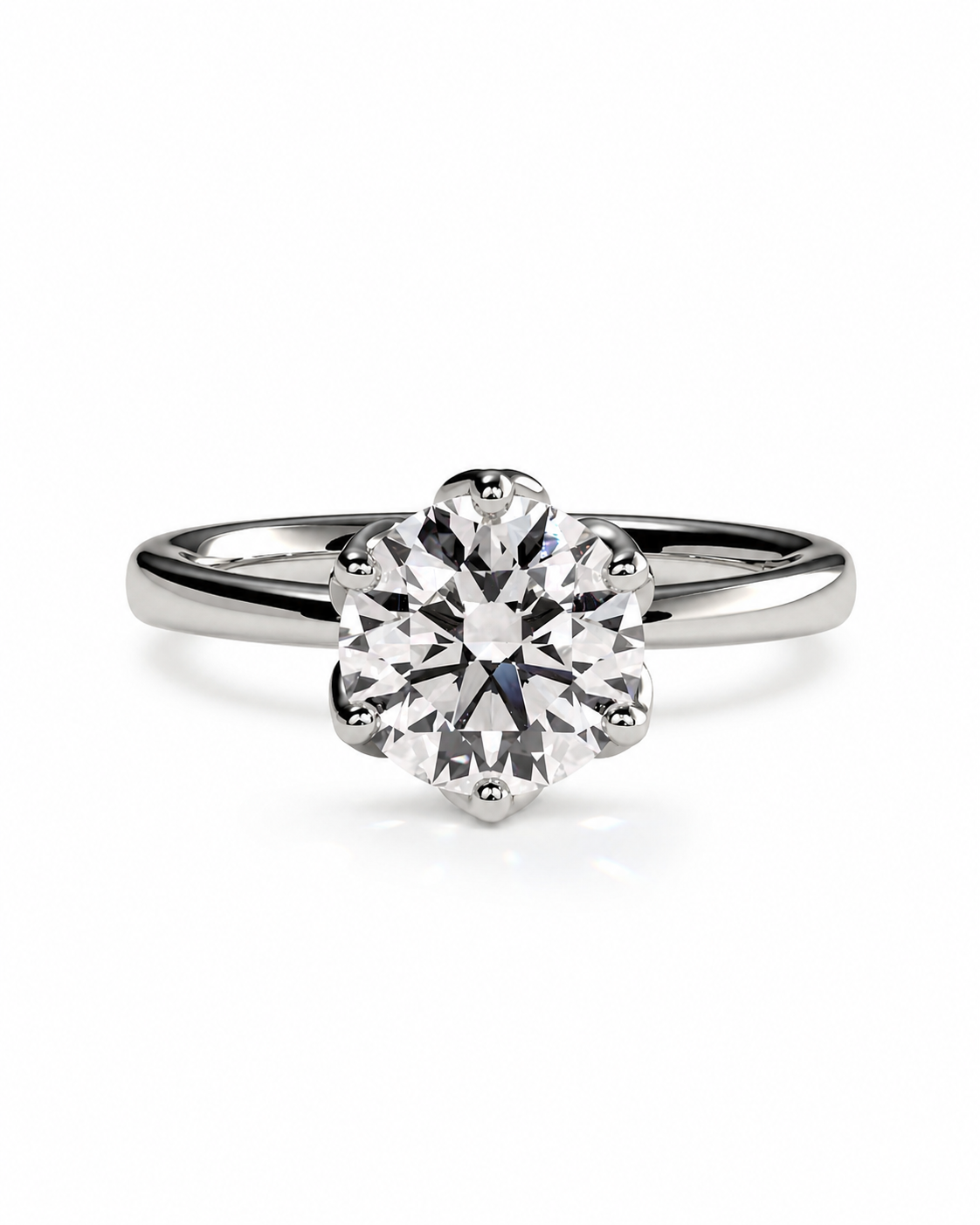 color_925_SIL,color_935_ARG,color_10K_WG, color_14K_WG &&A classic solitaire engagement ring featuring a round brilliant-cut diamond set in a polished silver-colored metal band, shown against a plain white background.