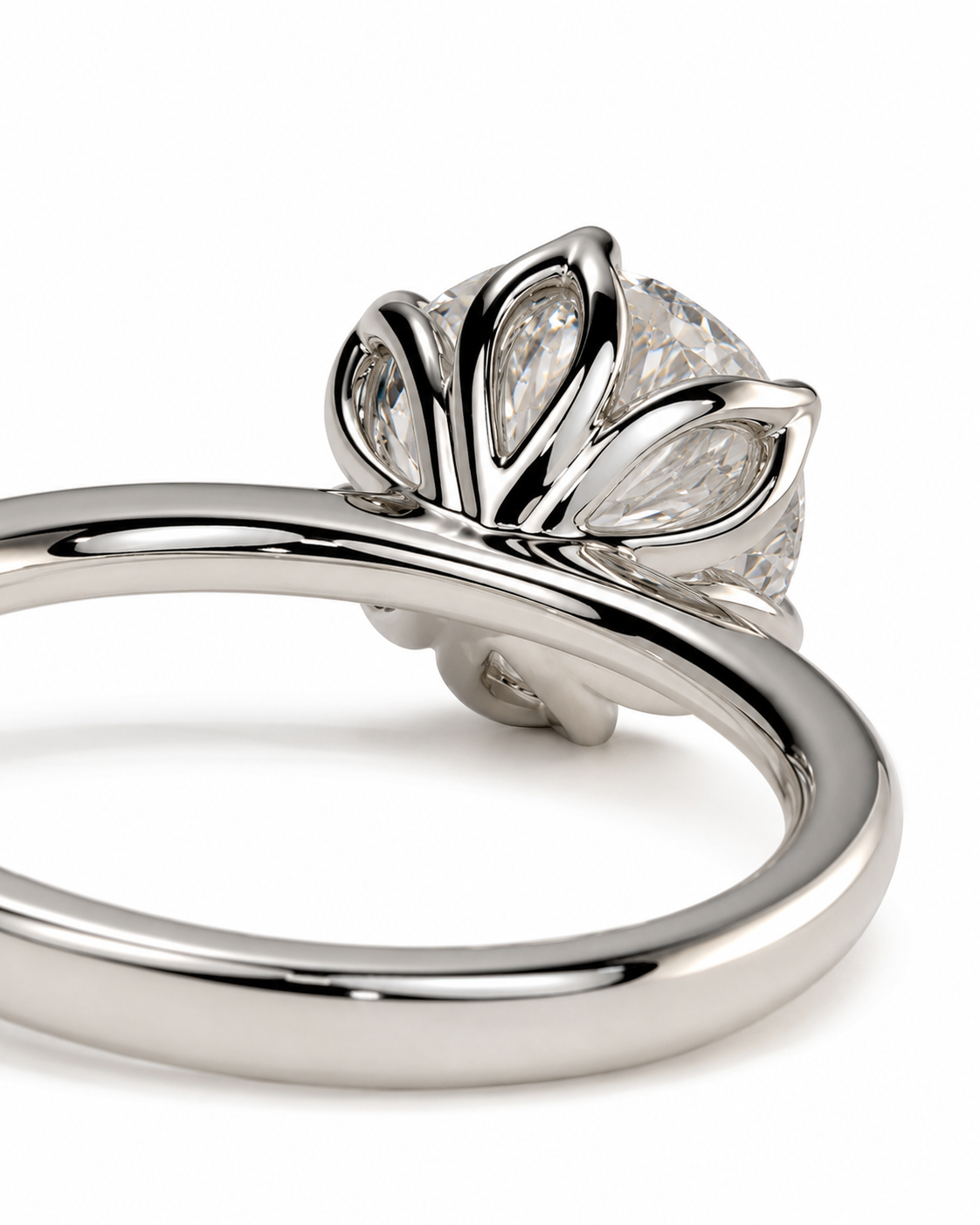 color_925_SIL,color_935_ARG,color_10K_WG, color_14K_WG &&A close-up studio shot of a silver ring with a sculptural, lotus-like floral crown set with clear gemstones, shown on a plain white background.