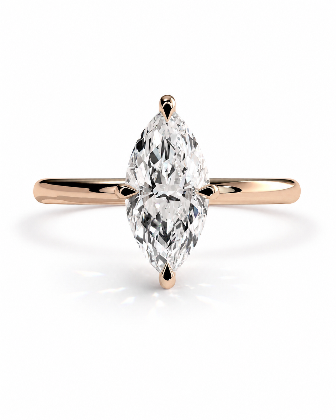 color_10K_RG, color_14K_RG &&A rose gold solitaire ring featuring a marquise-cut diamond center stone, set against a clean white background.