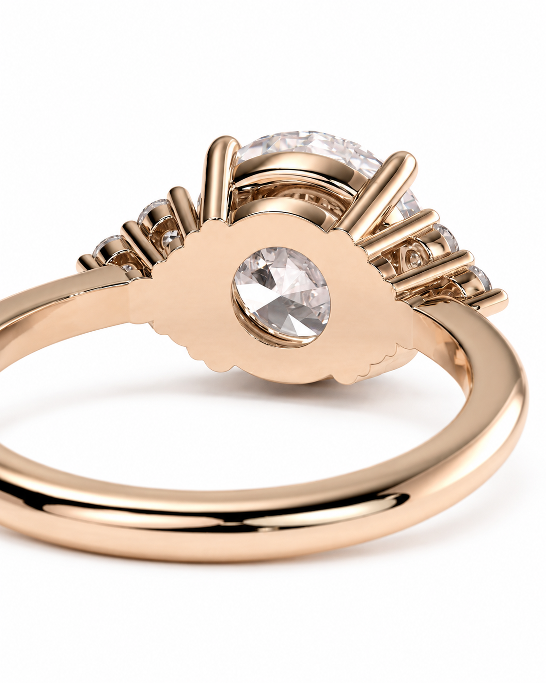 color_10K_RG, color_14K_RG &&Rose gold ring with a large round clear center stone and smaller accent stones along the band, shown on a clean white background.