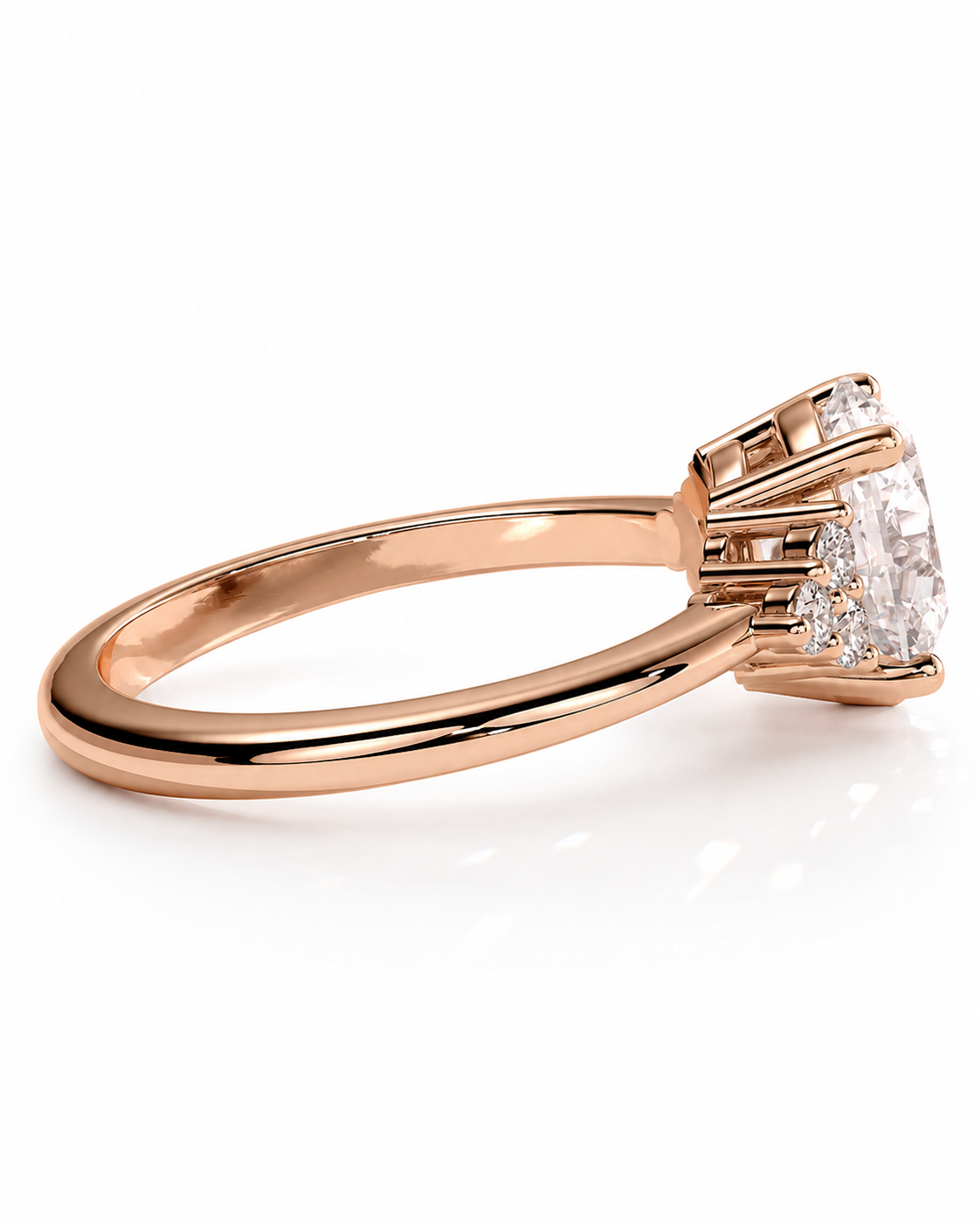 color_10K_RG, color_14K_RG &&A rose gold engagement ring featuring a large oval center stone and smaller side stones, shown on a clean white background.