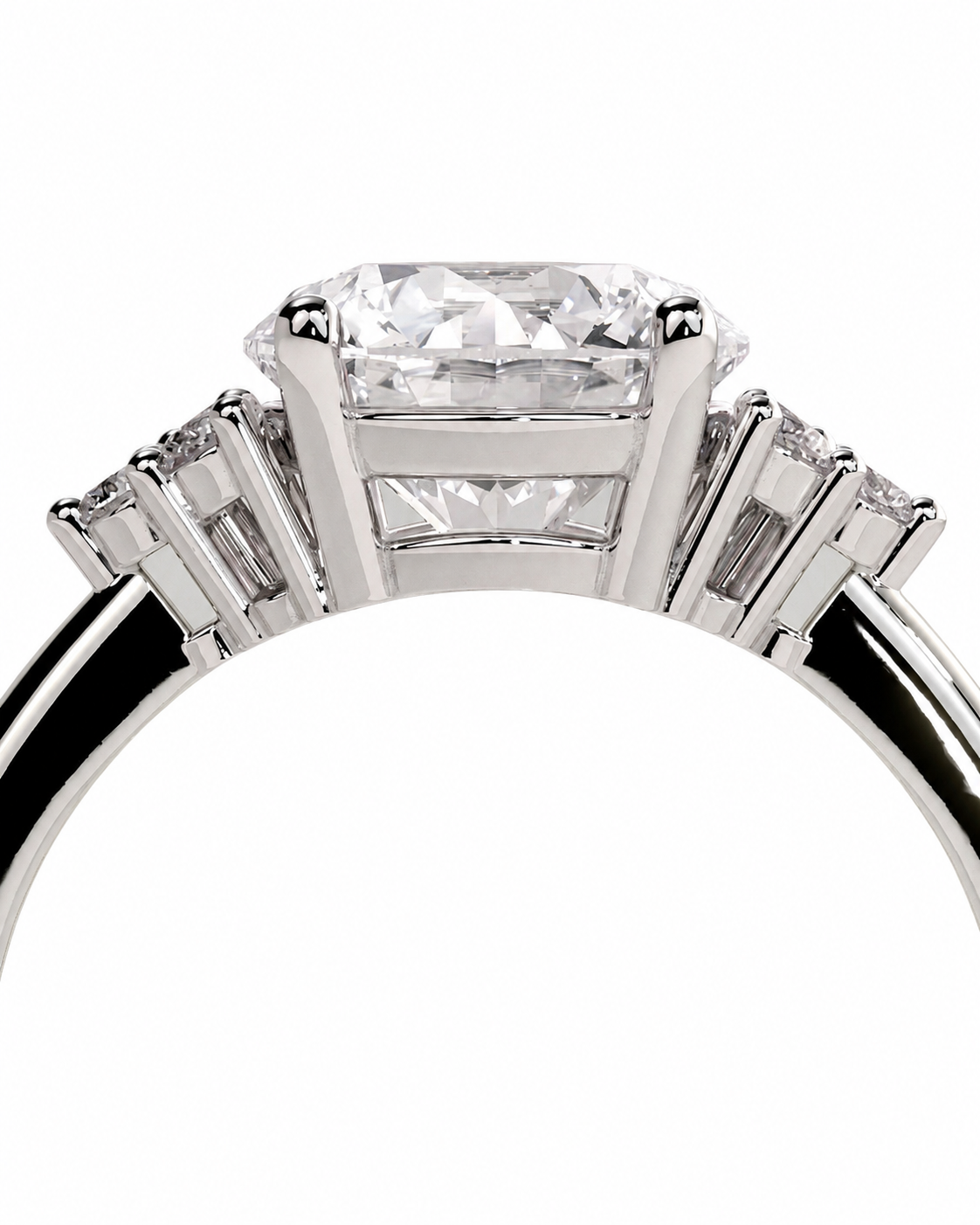 color_925_SIL,color_935_ARG,color_10K_WG, color_14K_WG &&A close-up studio shot of a silver-toned diamond ring featuring a rectangular princess-cut center stone and baguette side stones on a white background.