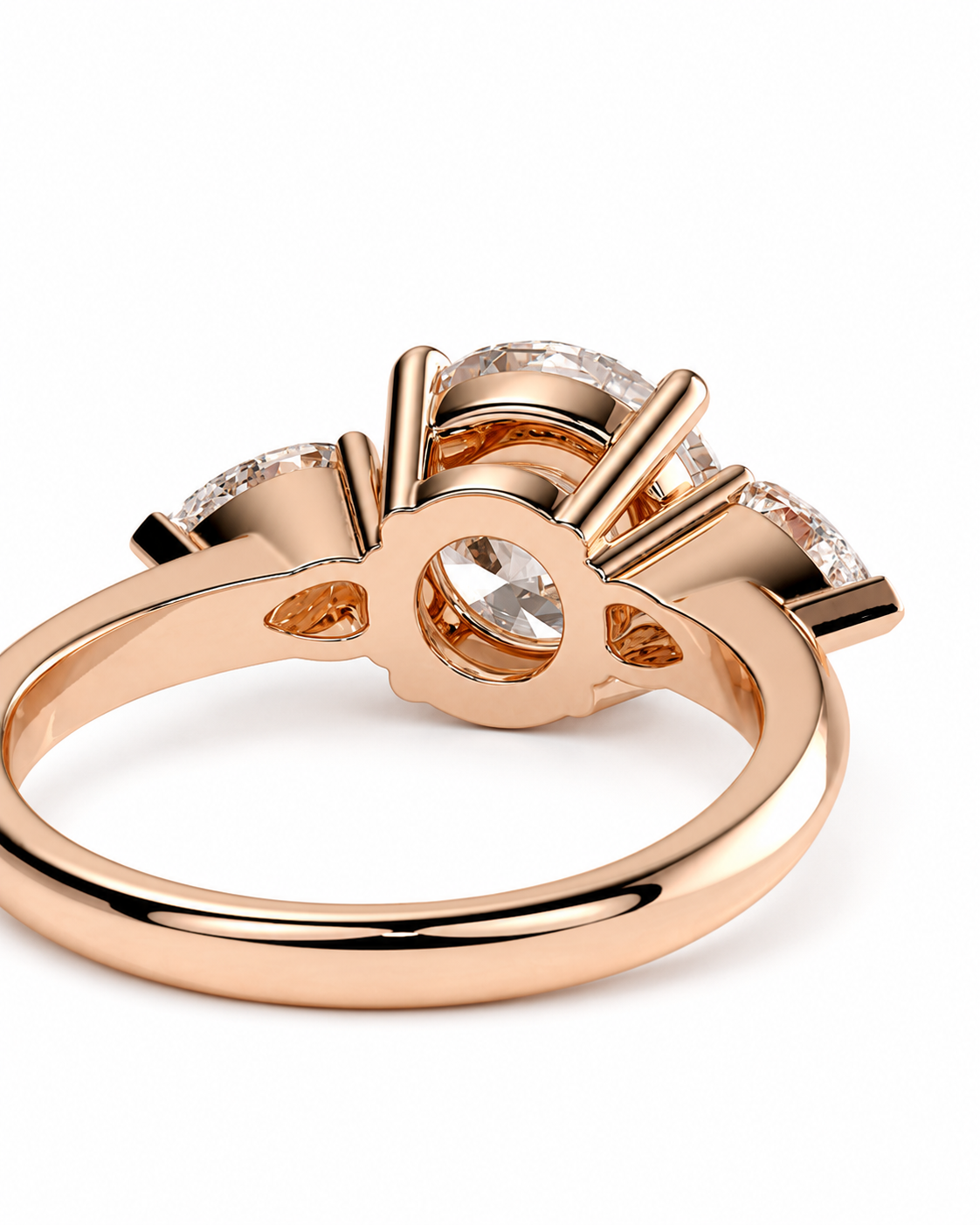 color_10K_RG, color_14K_RG &&Rose gold ring with a three-stone cluster setting featuring clear gemstones, shown on a clean white background.
