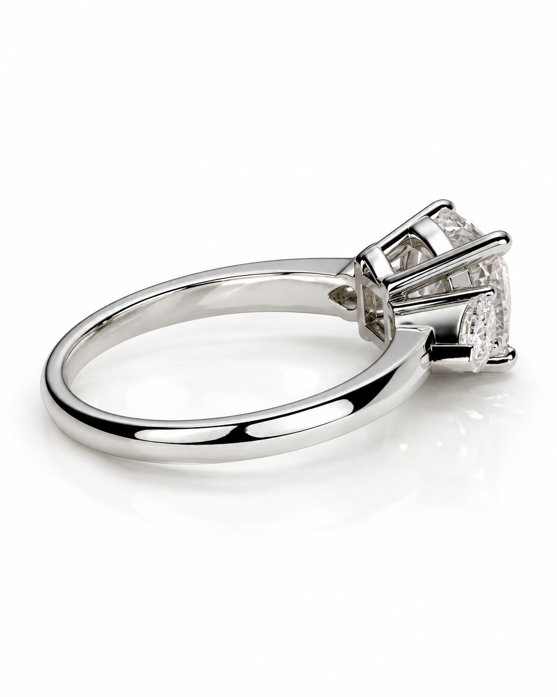 color_925_SIL,color_935_ARG,color_10K_WG, color_14K_WG &&A silver-toned diamond ring with a round brilliant-cut center stone in a four-prong setting, shown on a clean white background.