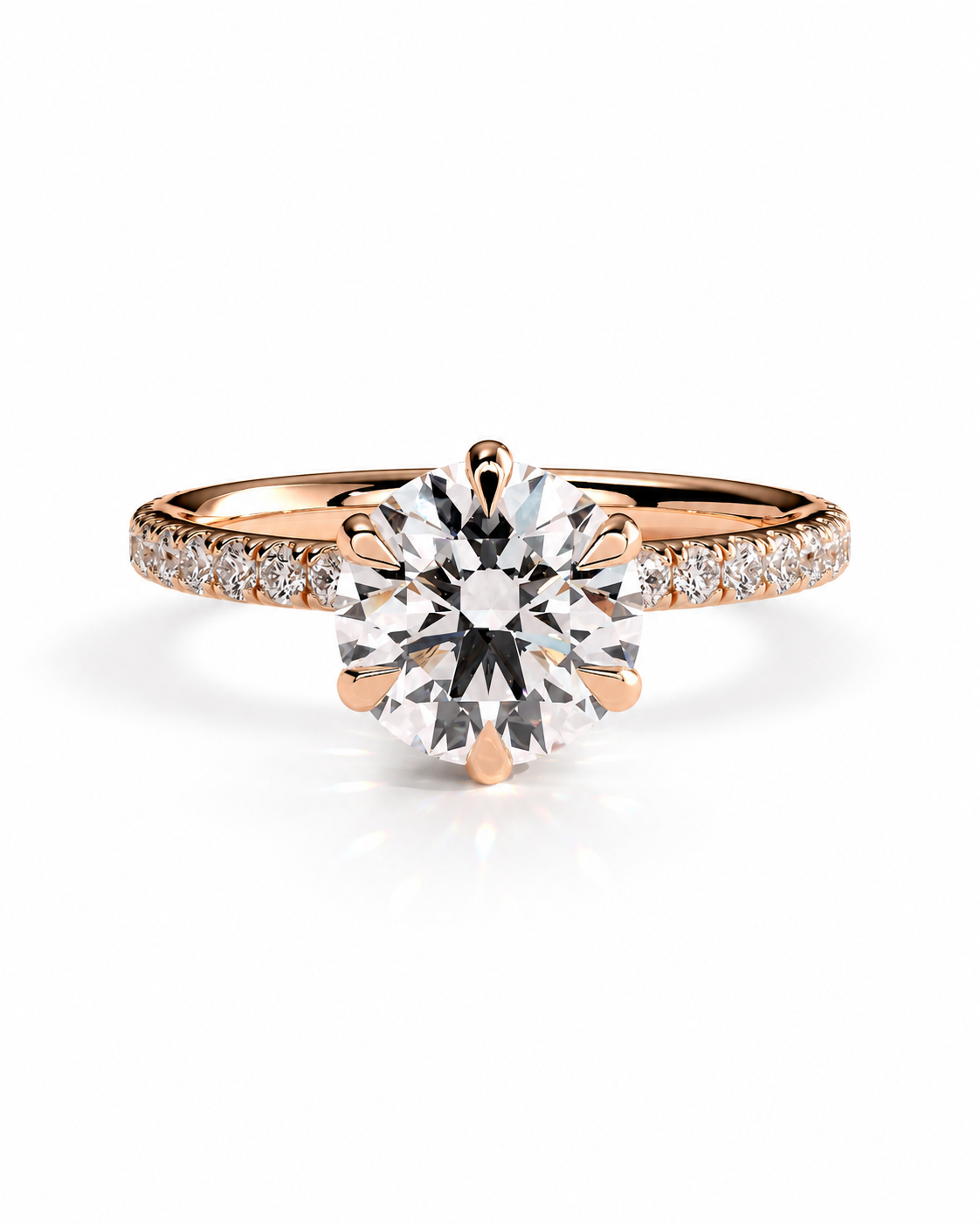 color_10K_RG, color_14K_RG &&A rose gold solitaire engagement ring featuring a large round-cut center stone and a pavé-set band with small accent diamonds, shown on a clean white background.