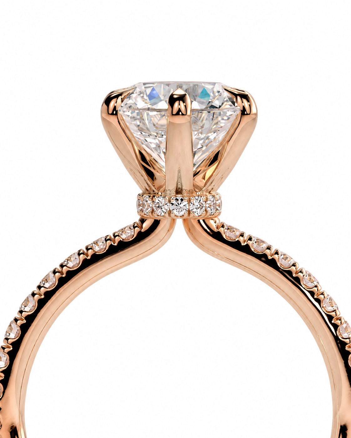 color_10K_RG, color_14K_RG &&Rose gold solitaire engagement ring with a large round brilliant-cut diamond center stone and a halo of small diamonds, shown on a white background.
