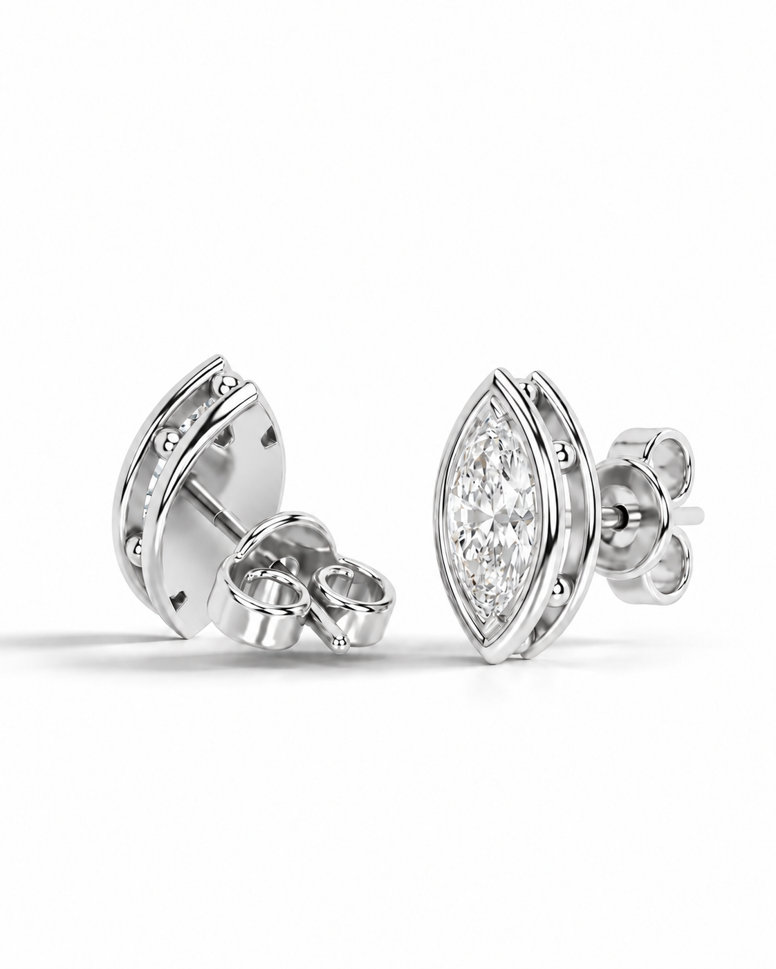 color_925_SIL,color_935_ARG,color_10K_WG, color_14K_WG &&A pair of silver stud earrings with marquise-cut clear gemstones, shown from both front and side angles on a clean white background.