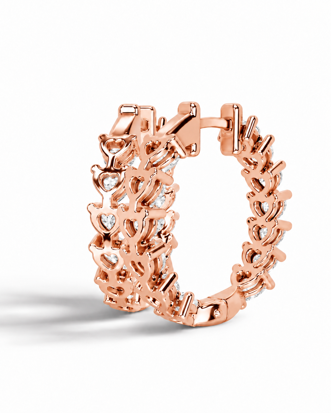 color_10K_RG, color_14K_RG &&Rose gold hoop earrings with a textured, openwork design set with small clear stones, shown on a clean white background.