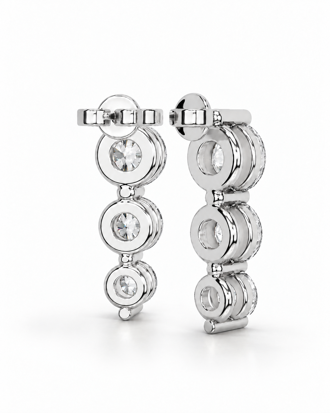 color_925_SIL,color_935_ARG,color_10K_WG, color_14K_WG &&A pair of silver-toned drop earrings with three round clear gemstones in each drop, shown on a clean white background.