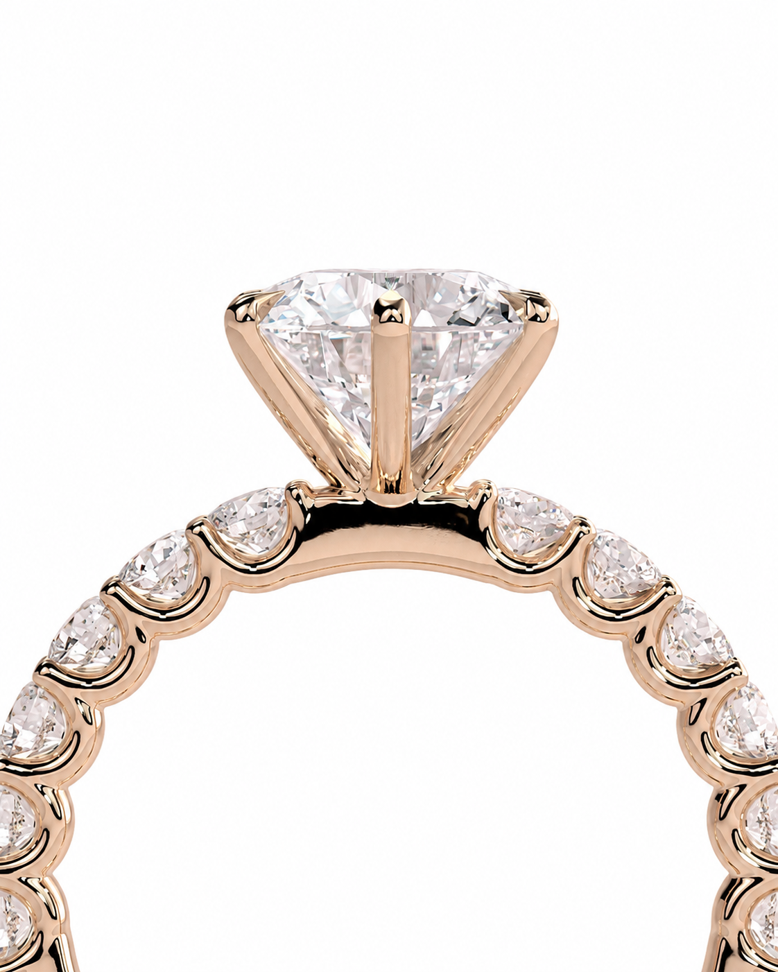 color_10K_RG, color_14K_RG &&Close-up of a rose gold diamond ring with a large round brilliant-cut center stone and a pavé band of small round diamonds on a white background.
