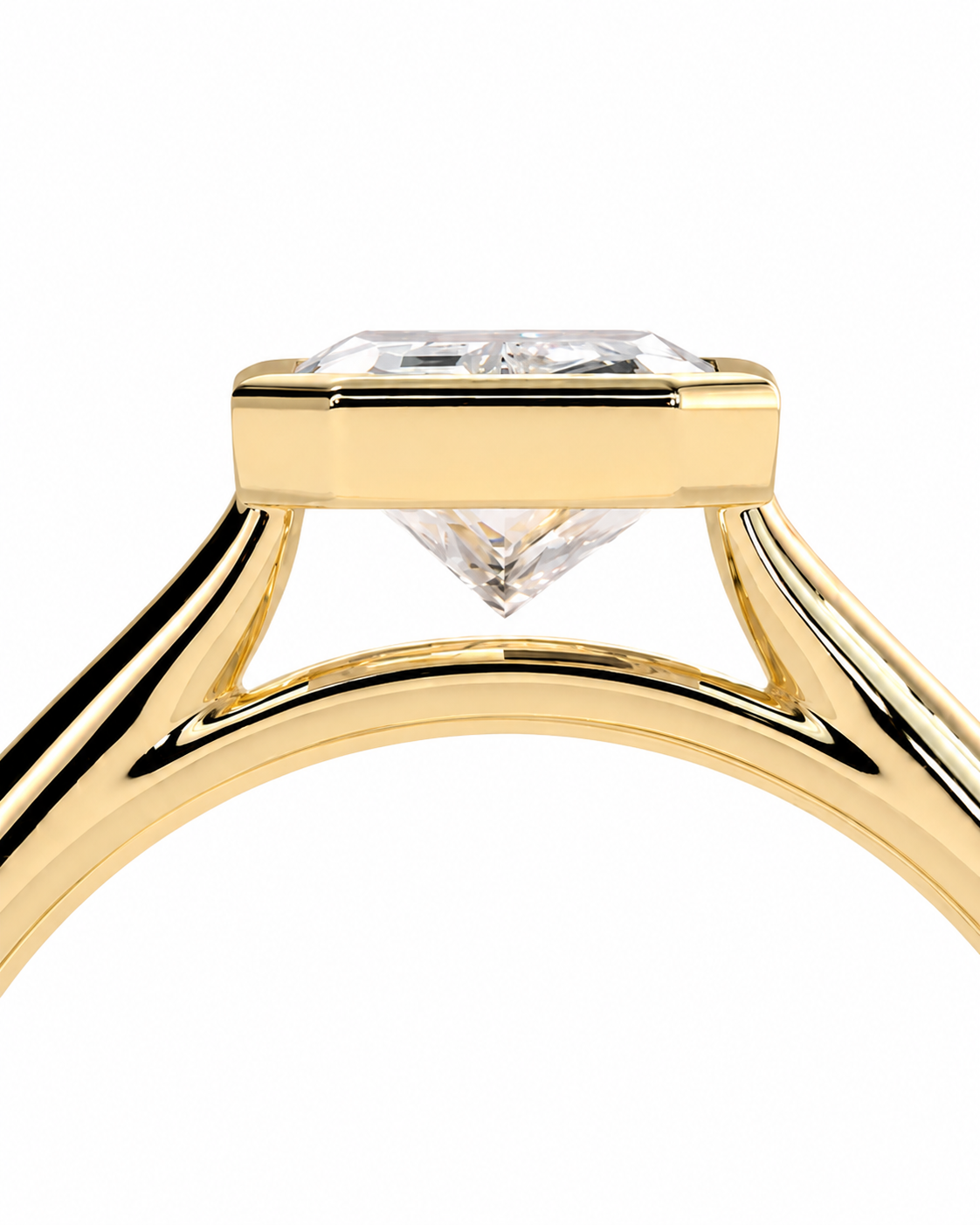 color_10K_YG, color_14K_YG &&Close-up of a yellow gold ring setting with a clear rectangular gemstone and a triangular center stone, shown on a white background.