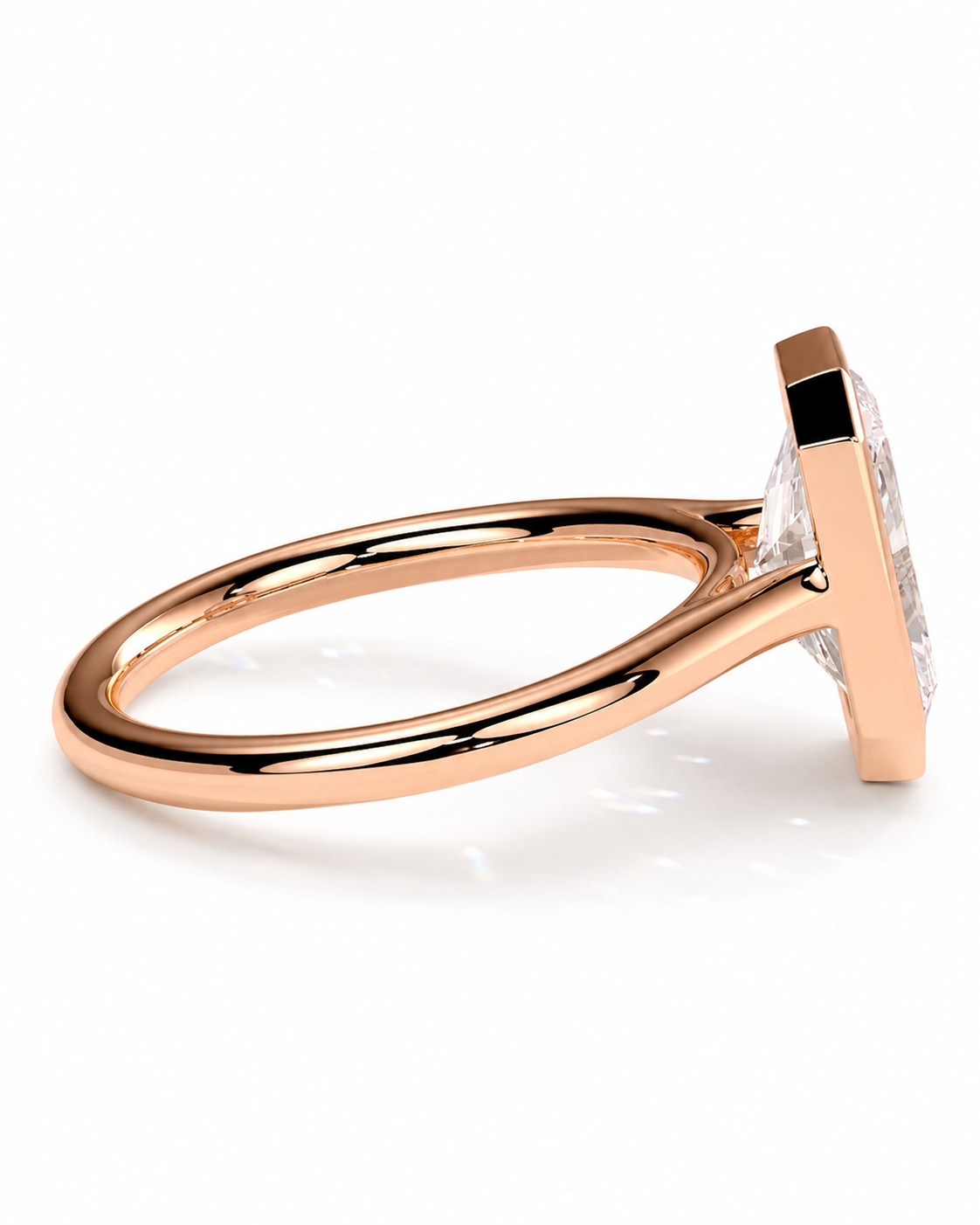 color_10K_RG, color_14K_RG &&A rose gold ring with a large clear rectangular gemstone in a prong setting, shown from a side angle on a clean white background.