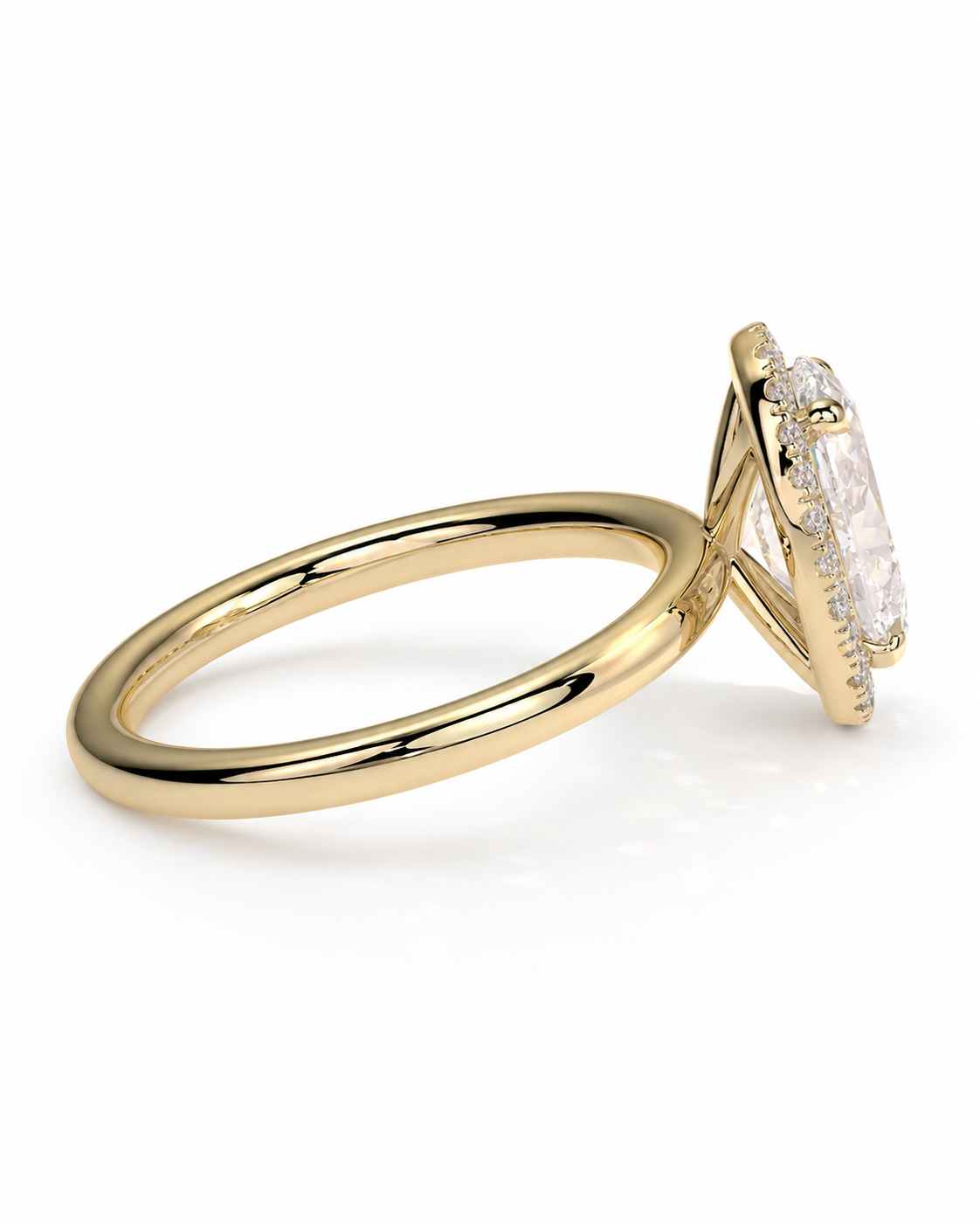 color_10K_YG, color_14K_YG &&A yellow gold ring with a triangular prong setting holding a marquise-cut clear gemstone, accented with small pavé stones along the sides, shown on a white background.