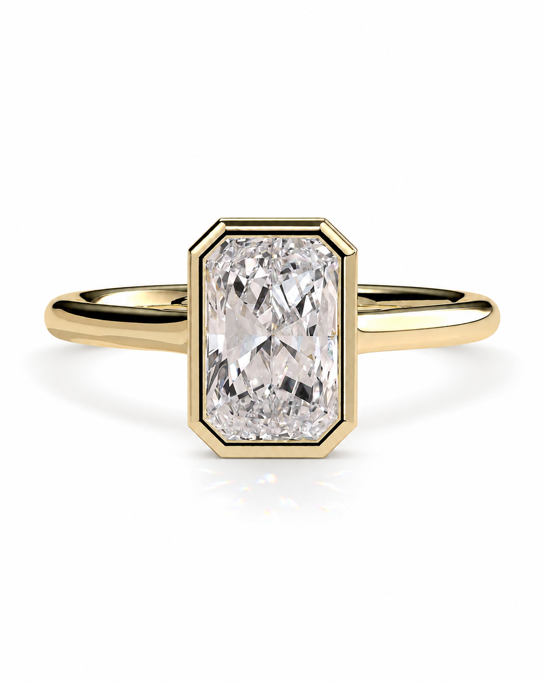 color_10K_YG, color_14K_YG &&A yellow gold ring featuring an emerald-cut diamond center stone in a beveled octagonal setting, shown on a clean white background.